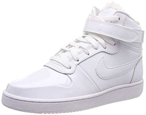 high top white nike shoes.